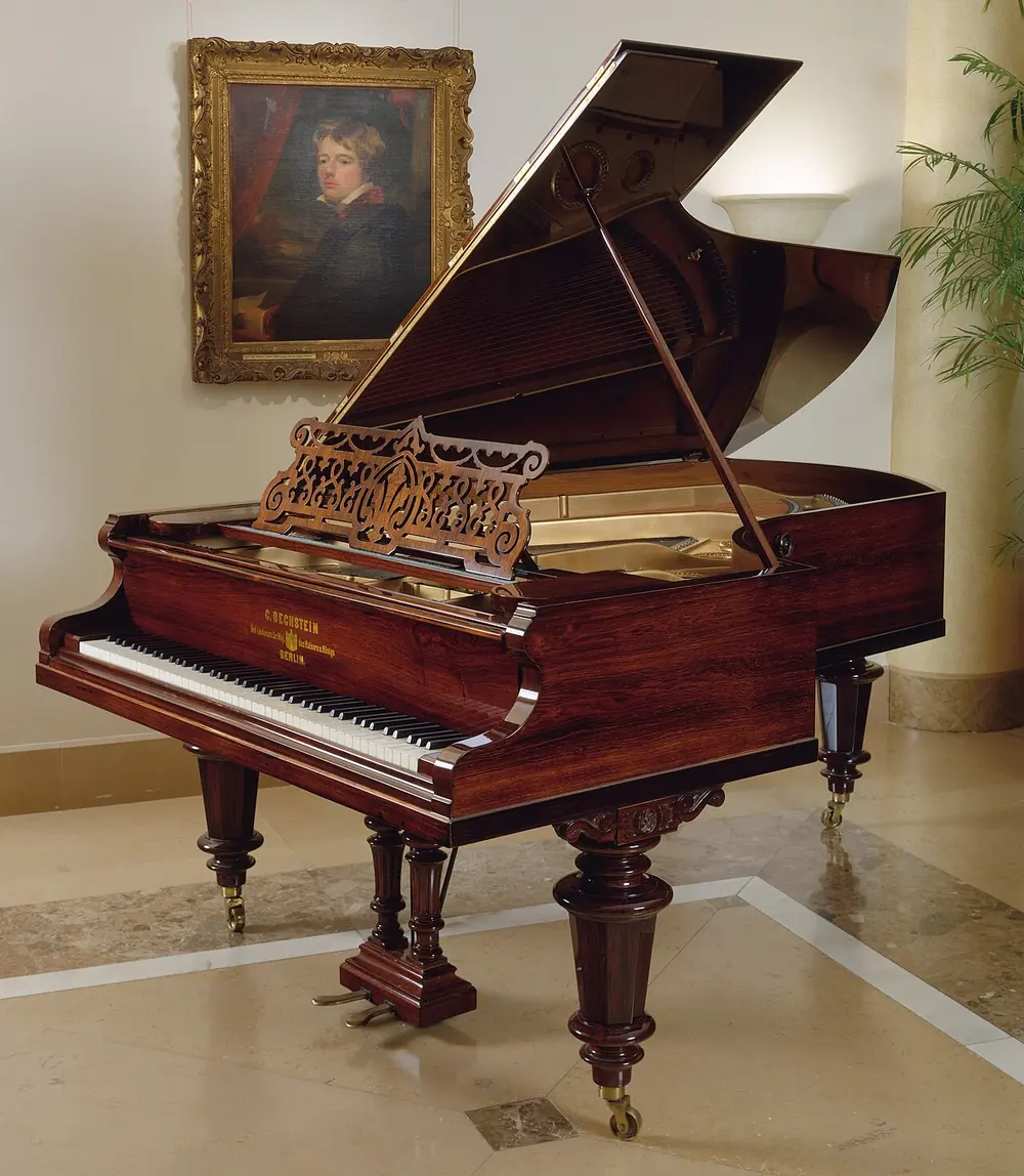 Antique C. Bechstein grand piano in carved rosewood case