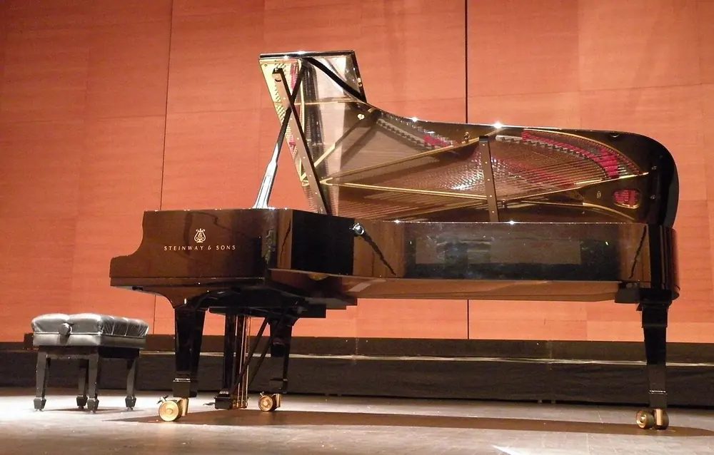 Steinway & Sons concert grand on a stage